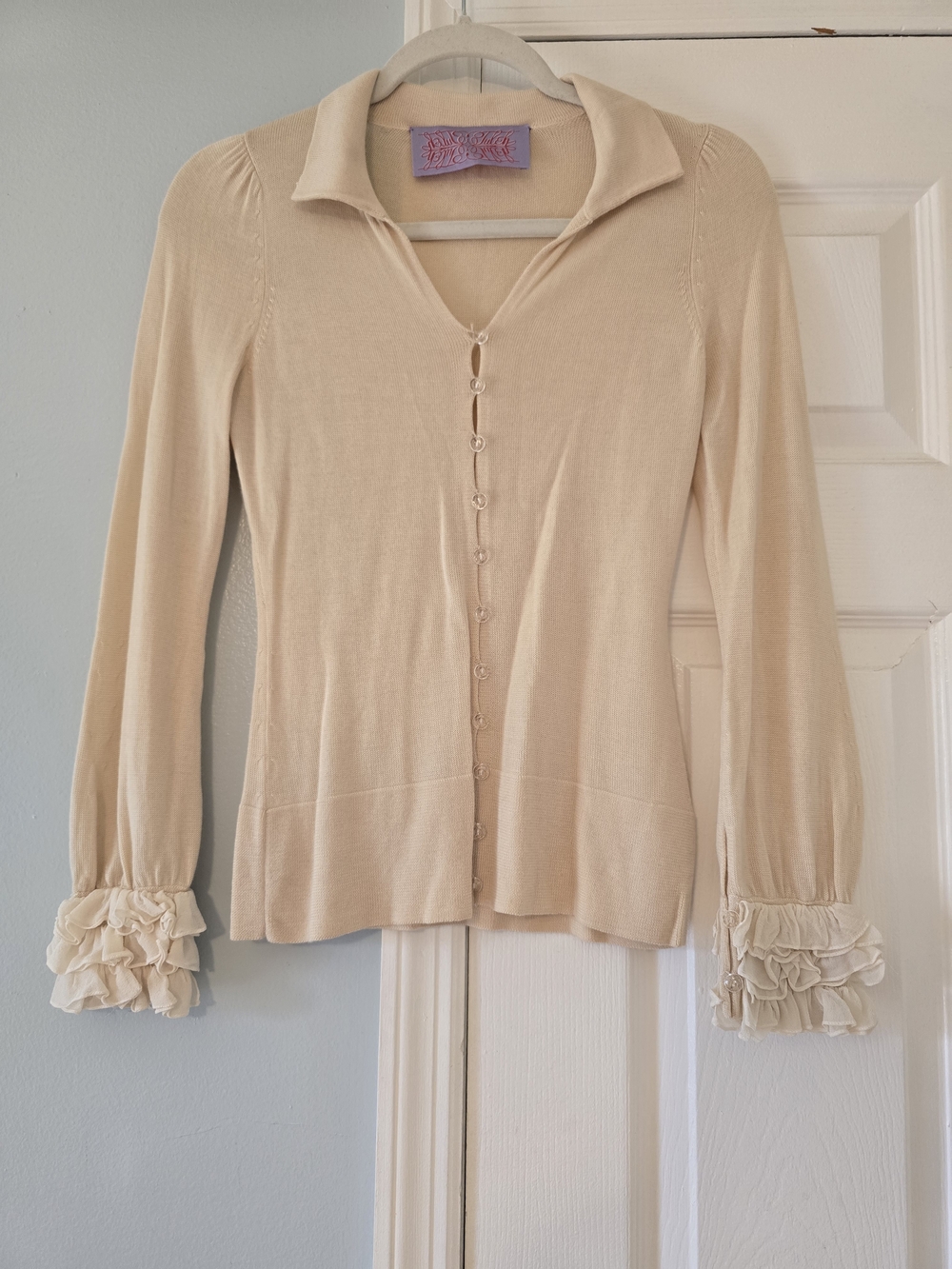 Tuleh Cream Ruffle Cuff Button-Down Top